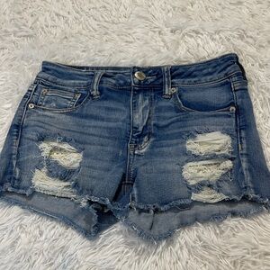 AMERICAN EAGLE NEXT LEVEL STRETCH HI RISE SHORTIE Distressed Denim Women SIZE 4